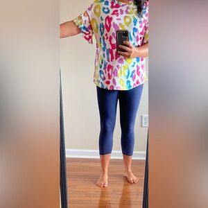 Heimish U.S.A women’s size S multi-colored leopard print with flowy sleeves.